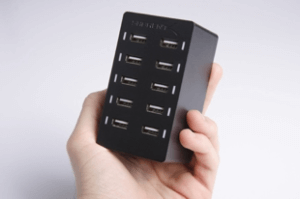 Sabrent 10 port USB charger in hand