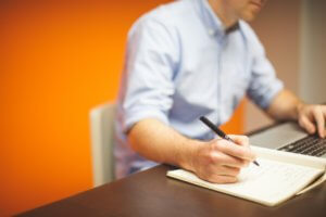 man studying at a desk